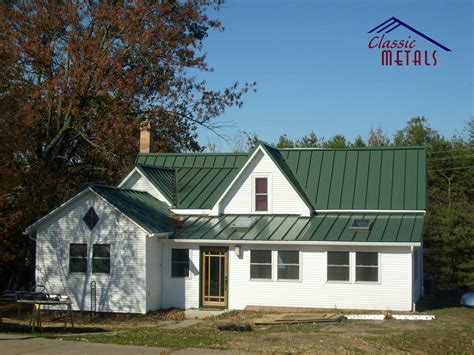 tan house green metal roof|dark green metal roof.